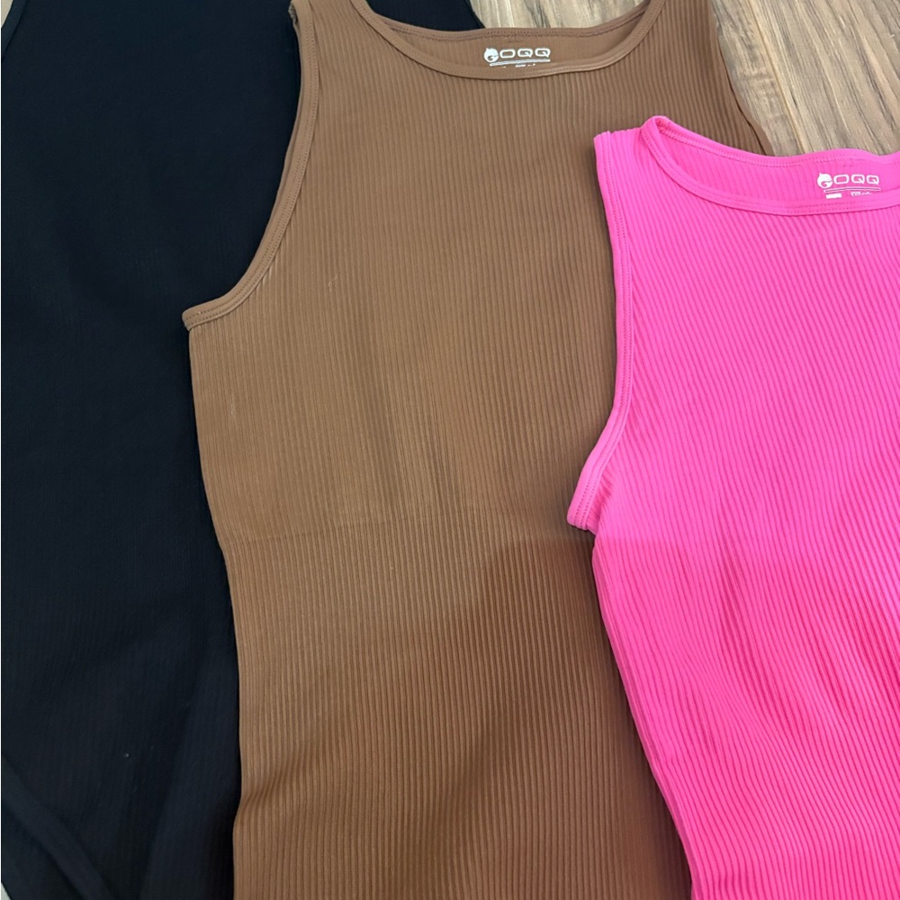 Set of 3 Bodysuits 🖤🩷🤎 – Barely Worn